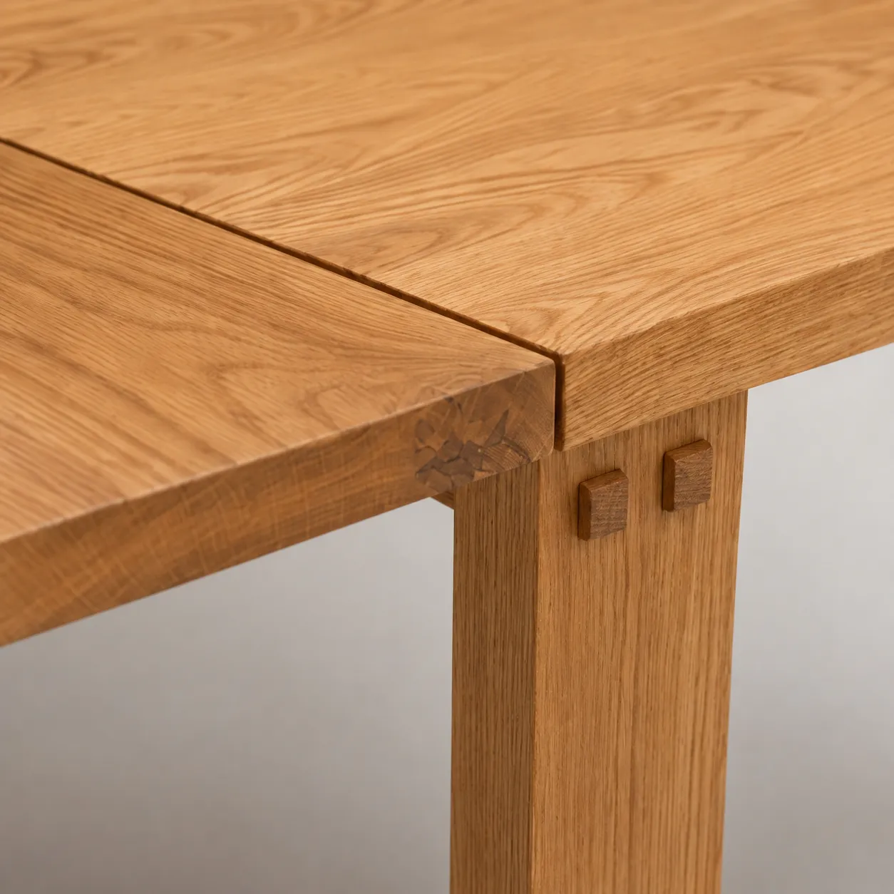 Through-tenon pegs on the Beseda Table top, up close