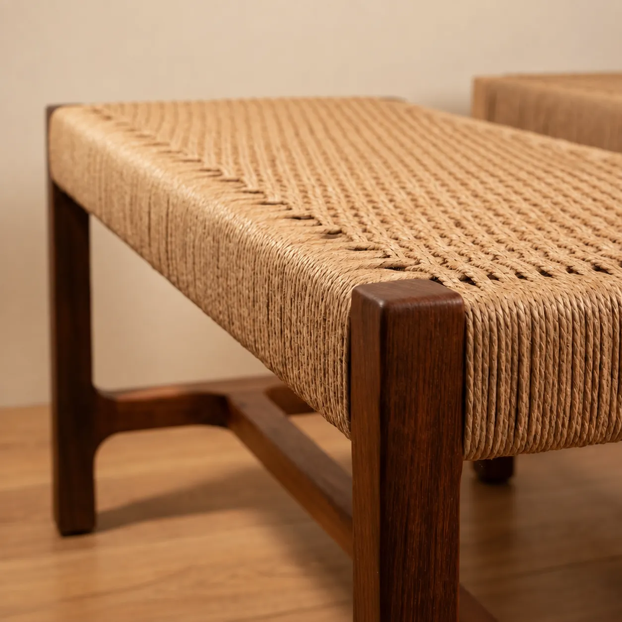 Corner of the Cordeaux Bench seat — hand-woven cord and timber frame
