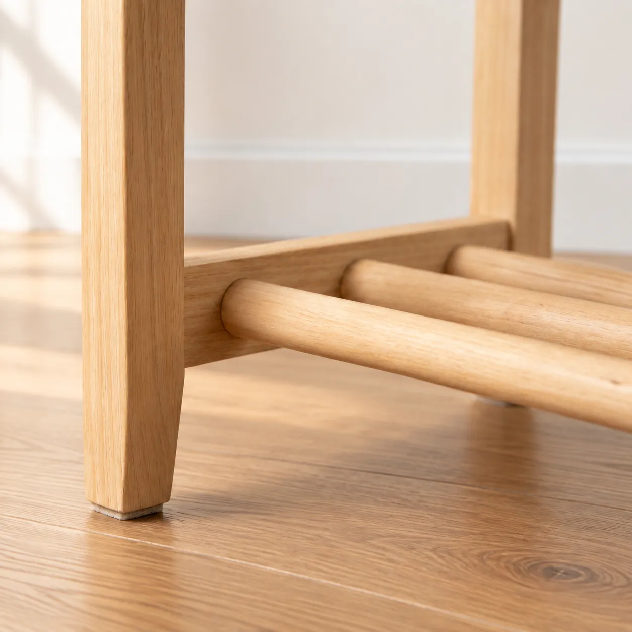 The shelf rails of the Lavka Bench, up close