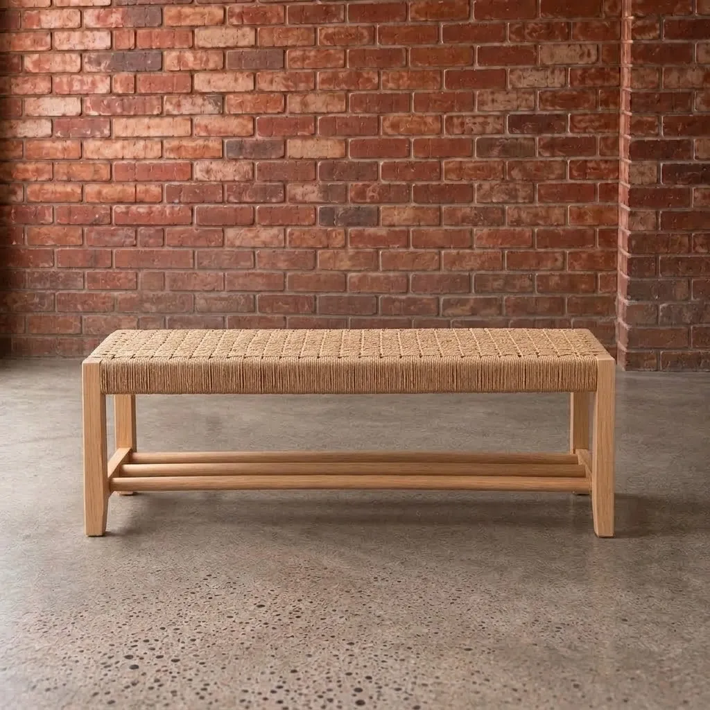 Two Lavka Benches — natural cord, and a longer piece in Walnut with black cord